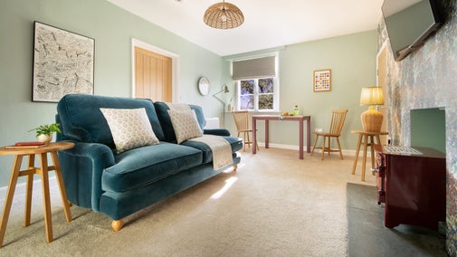 The sitting and dining room at Restharrow, Cumbria
